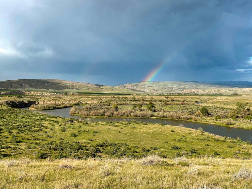 Rainbow over a river in Wyoming.