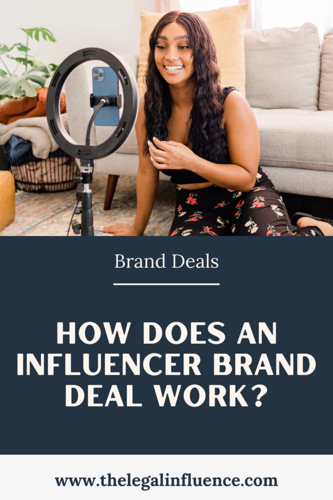 Influencer filming content with text that says "how does an influencer brand deal work?"